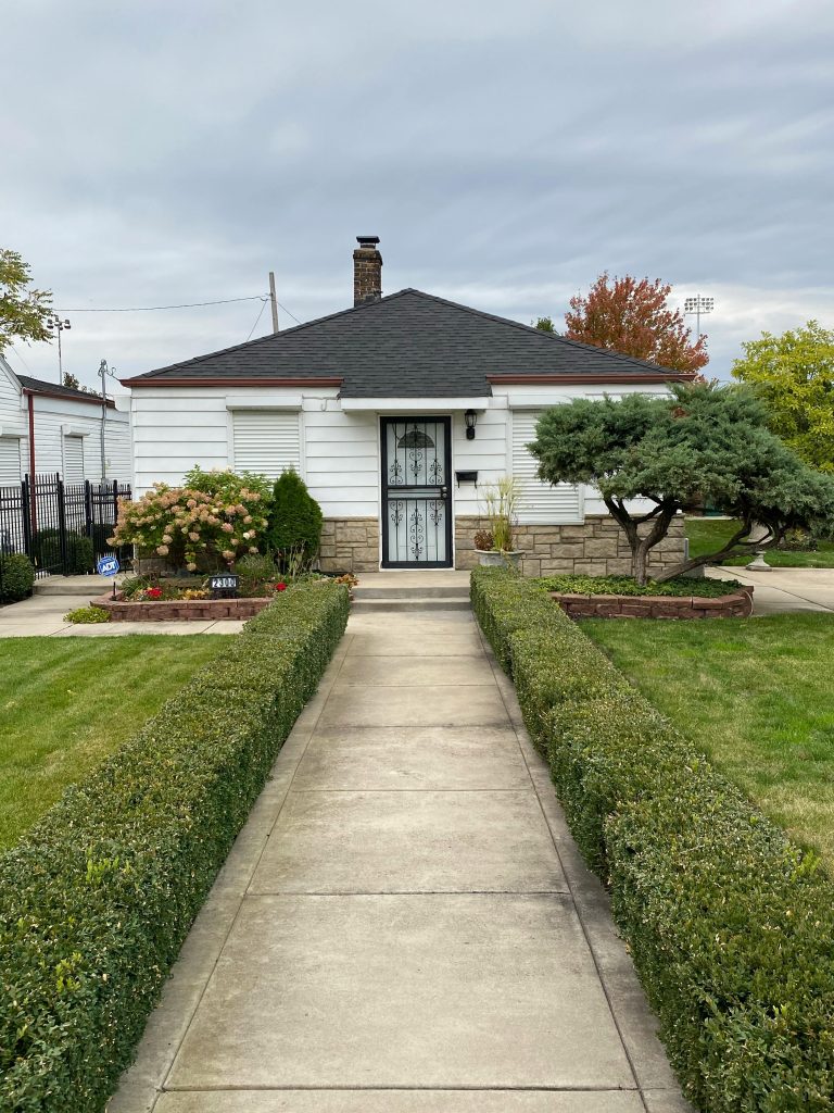 Charming suburban house with well-kept garden in Gary, Indiana.